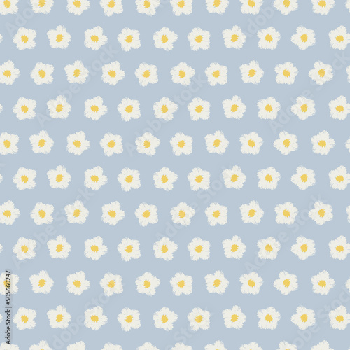 Seamless colorful pattern with hand drawn viola flower heads in rows on blue background for surface design and other design projects