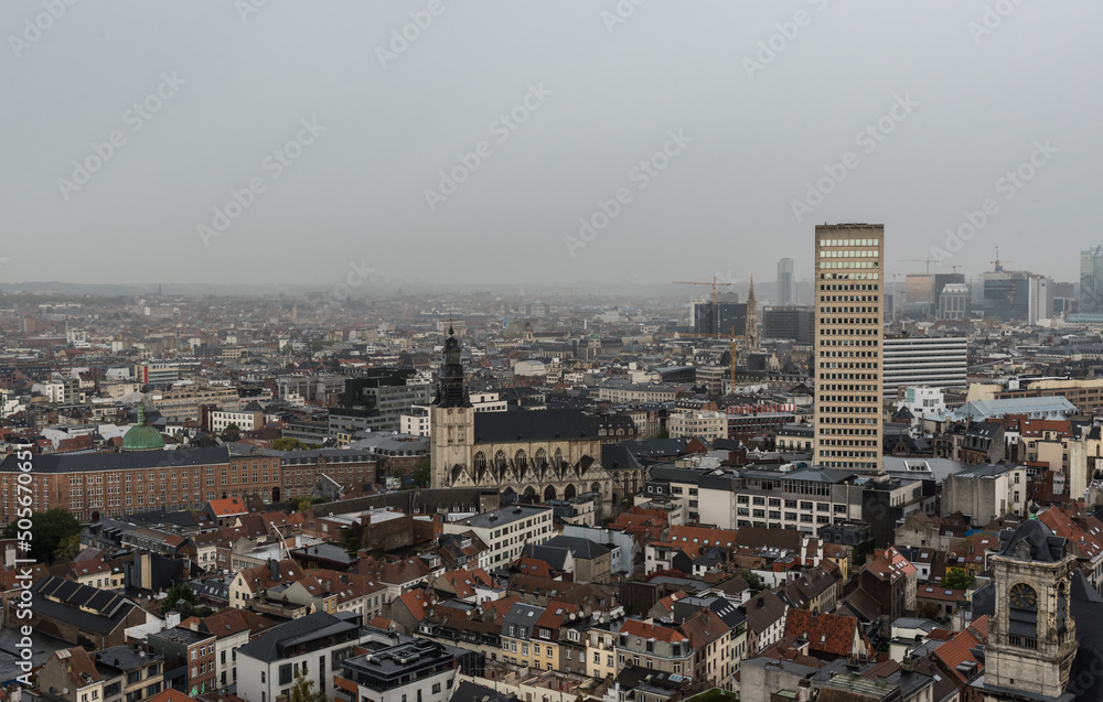 Brussels Capital Region - Belgium - Aerial view over the Brussels Skyline with changing rainy and foggy weather