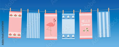happy summer holiday banner with colorful hanging towels