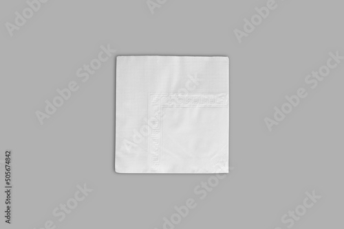 White square napkin isolated on a grey background. 3d rendering. photo