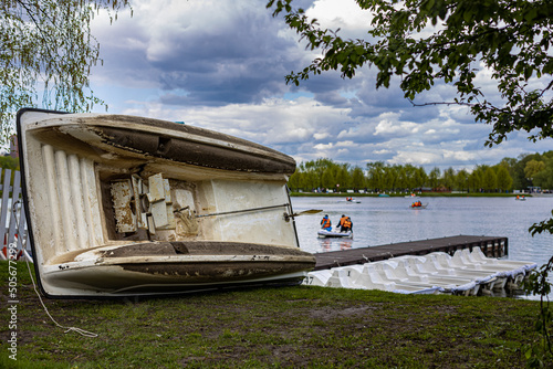  rowing catamaran is under repair on land