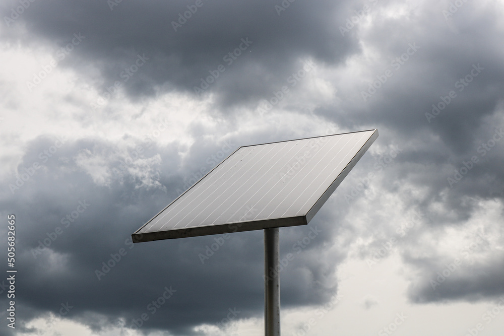 Solar panel with grey clouds Solar panel with grey clouds