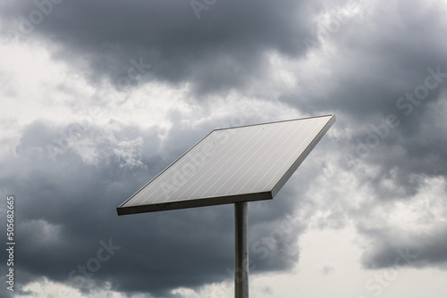 Solar panel with grey clouds
