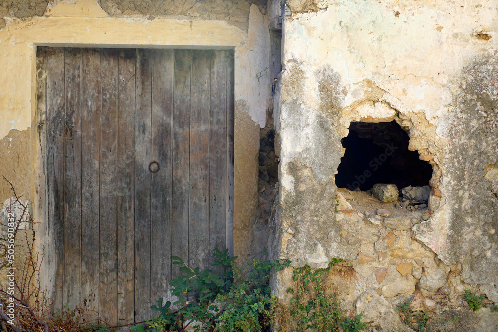 Hole is a distressed wall Hole is a distressed wall
