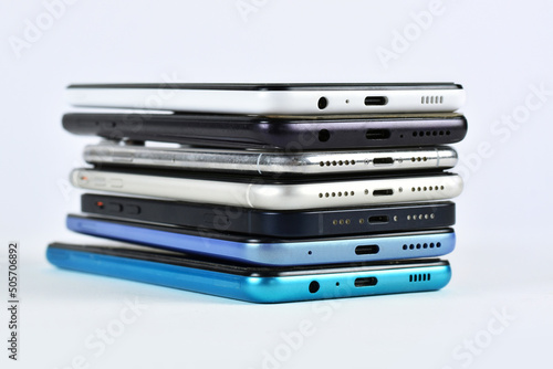 A pile of mobile phones, smartphones ...