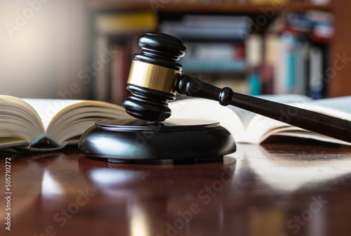 Judge's gavel and wooden block used in trials and auctions.
Conceptual justice, law, right, criminal procedure