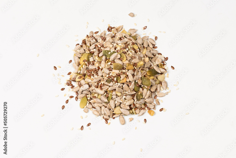 Mix of seeds for a salad. A pile of mixed seeds. Mix of seeds for a salad. A pile of mixed seeds.