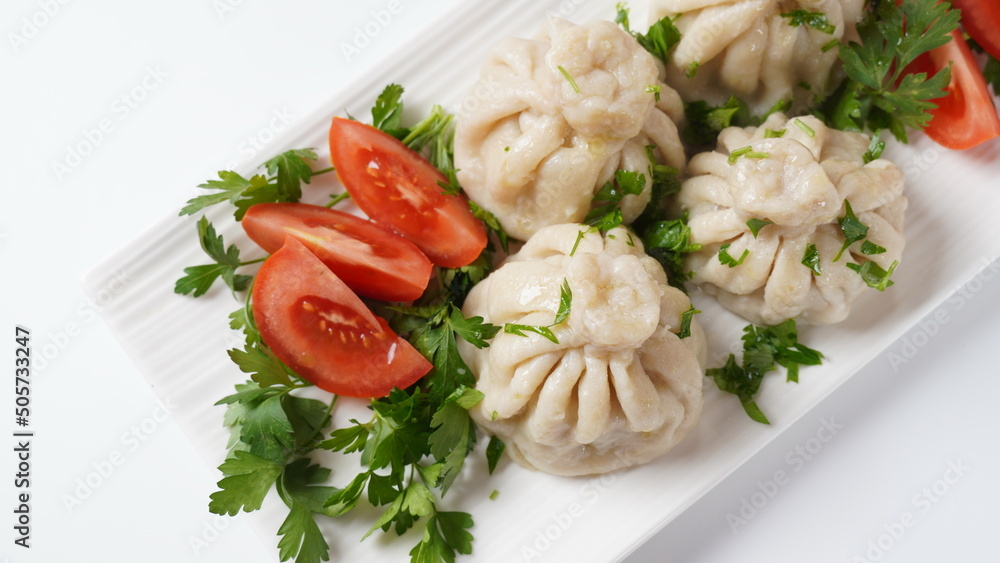 Φωτογραφία Georgian dumplings Khinkali with meat and red pepper, Traditional National Georgian cuisine