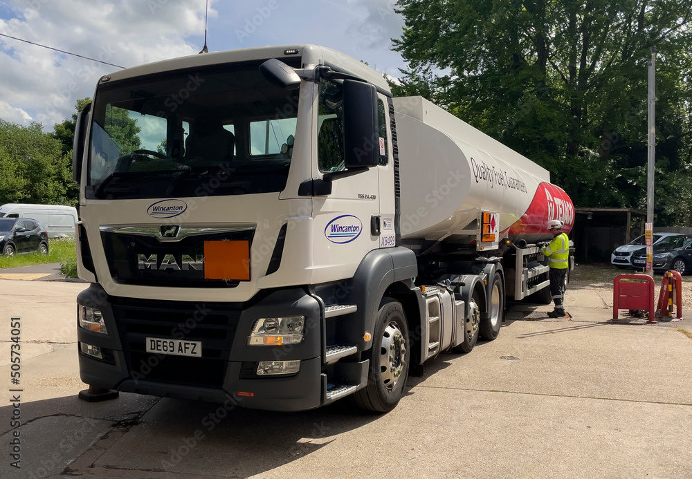 Hampshire, England, UK. 2022. Fuel tanker delivering fuel to a petrol