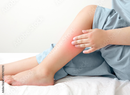 Leg pain or calf muscle, child in bad, healthy concept