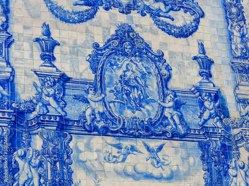 Porto, Portugal - July 30 2019: Portuguese blue tiles art (azulejos) at The Chapel of Souls (Capela das Almas)