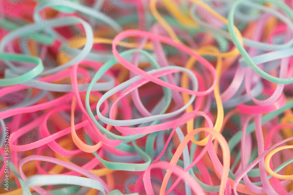 small and multicolored rubber bands accessories background