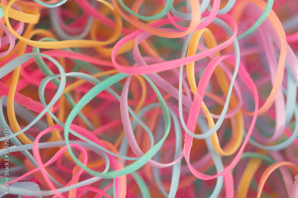 small and multicolored rubber bands accessories background