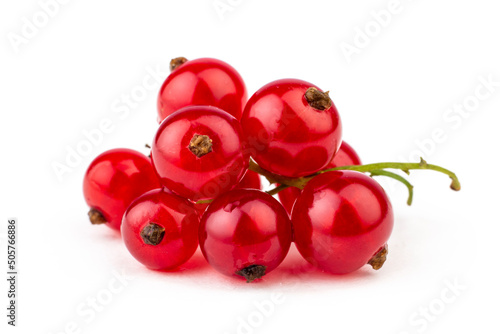 Ripe and juice red currant on white isolated background.