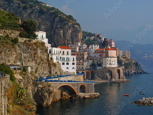 The typical pretty town Atrani with blue sea and sky on the famous Amalfi coast in So