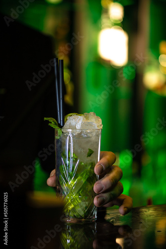 hand holding mojito