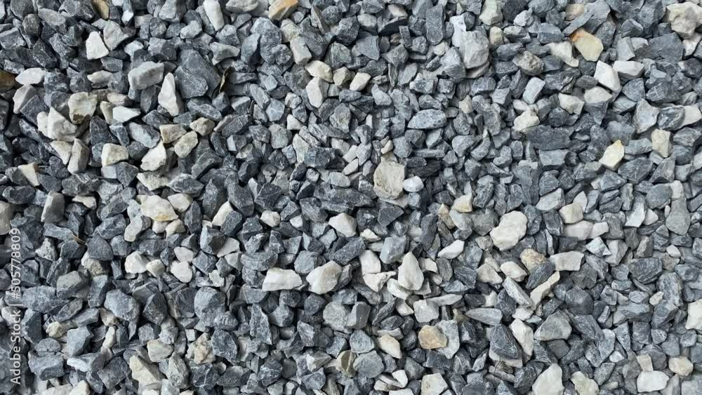 Natural abstract background of small stones. Top view, static video shooting. Natural abstract background of small stones. Top view, static video shooting.
