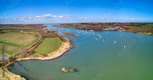 Panaramic aerial landscape image of River Median with Cowes in the background on a sunny day