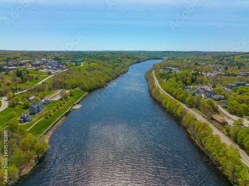 Kennebec River in spring aerial view near historic downtown of Augusta, Maine ME, USA. 