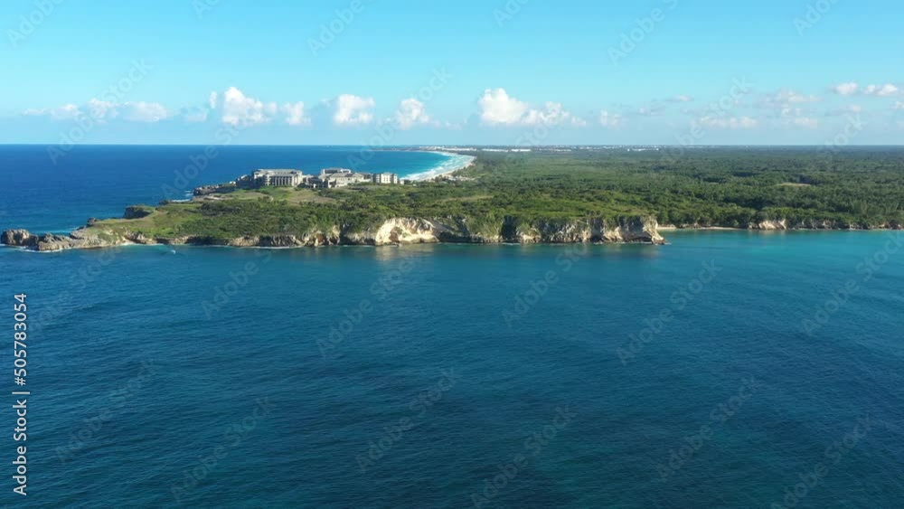 Stone cliff washes with Atlantic ocean. Macao beach. Dominican Republic. Aerial drone view Stone cliff washes with Atlantic ocean. Macao beach. Dominican Republic. Aerial drone view