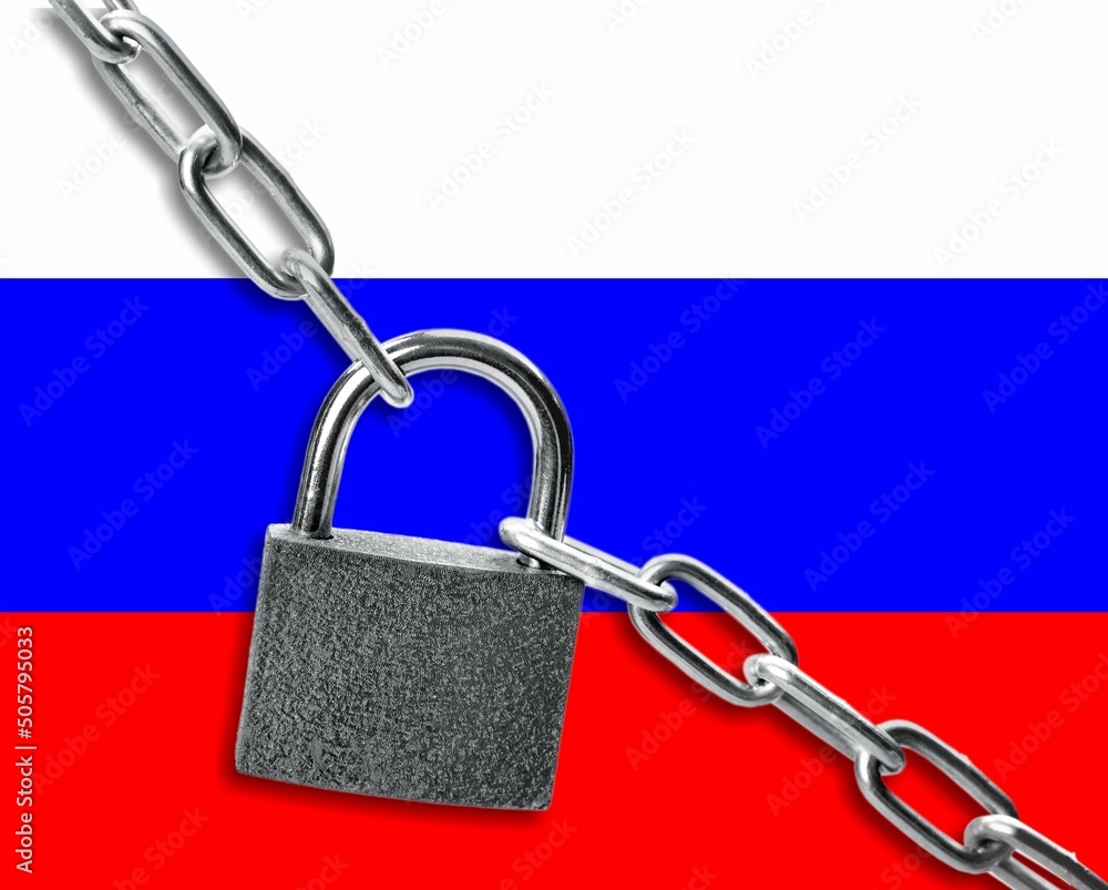 Big metal padlock on flag of Russia. Concept of sanctions on Russia Big metal padlock on flag of Russia. Concept of sanctions on Russia