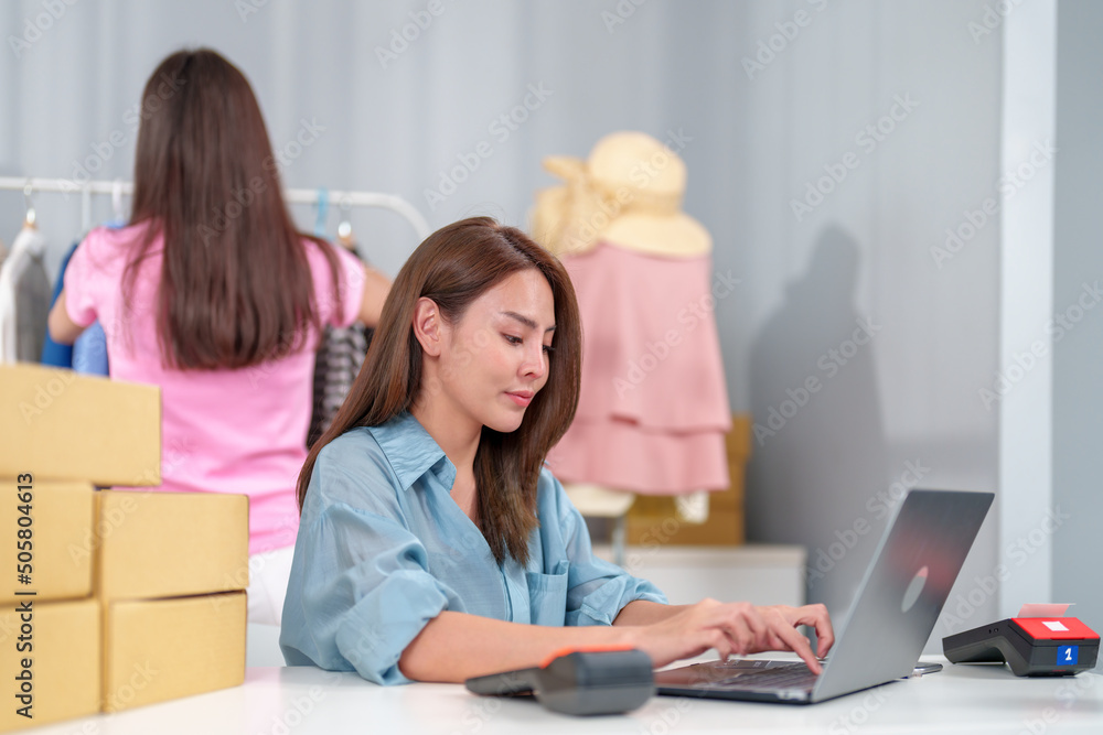 Young business owner working and selling online product and prepare packaging for the customer order. Young business owner working and selling online product and prepare packaging for the customer order.
