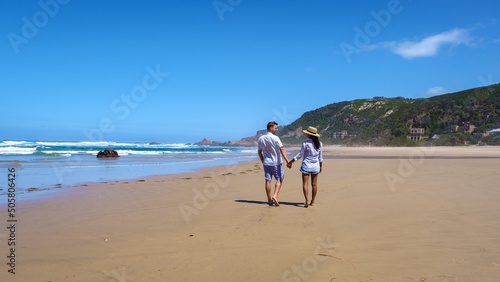 A panoramic view of the lagoon of Knysna, South Africa. beach in Knysna, Western Cape, South Africa. couple man and woman on a trip at the garden route 