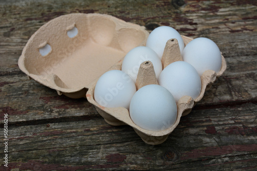 eggs in paper egg carton .Eggs in paper tray. photo