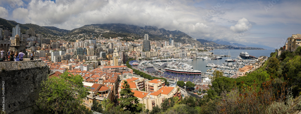 Panorama with the Monaco city and port during a spring sunny day with the F1 circuit construction under way.