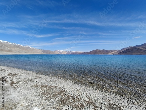 Fototapeta Naklejka Na Ścianę i Meble -  Pangong Blue lake in ladakh, India Kashmir, Jammu, Pangong near India China Border Blue Water and Clear Sky with Mountians