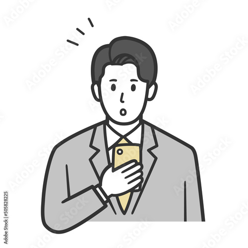 スマホを見て驚くビジネスマン