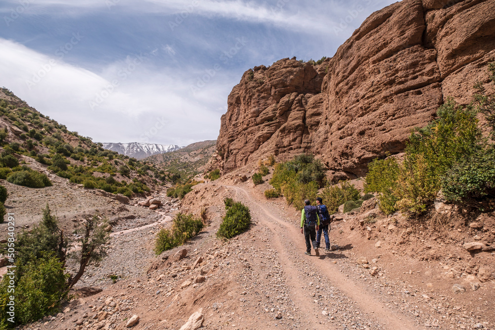 walkers on the road, Arous, Bougames valley, Atlas mountain range, morocco, africa walkers on the road, Arous, Bougames valley, Atlas mountain range, morocco, africa