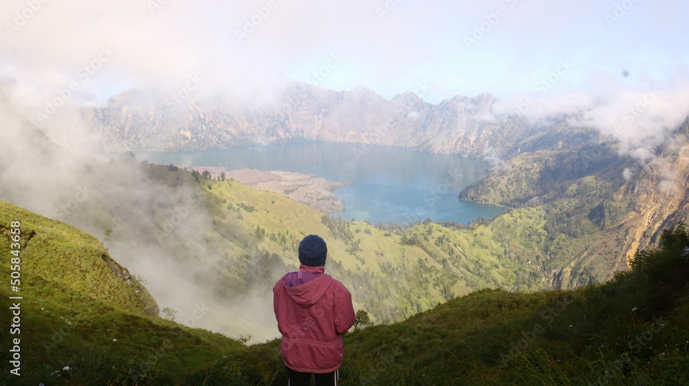 Woman seeing Segara Anak Lake in Rinjani Mountain