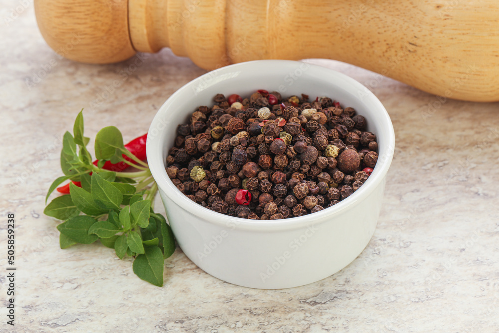 Peppercorn mix heap in the bowl Peppercorn mix heap in the bowl