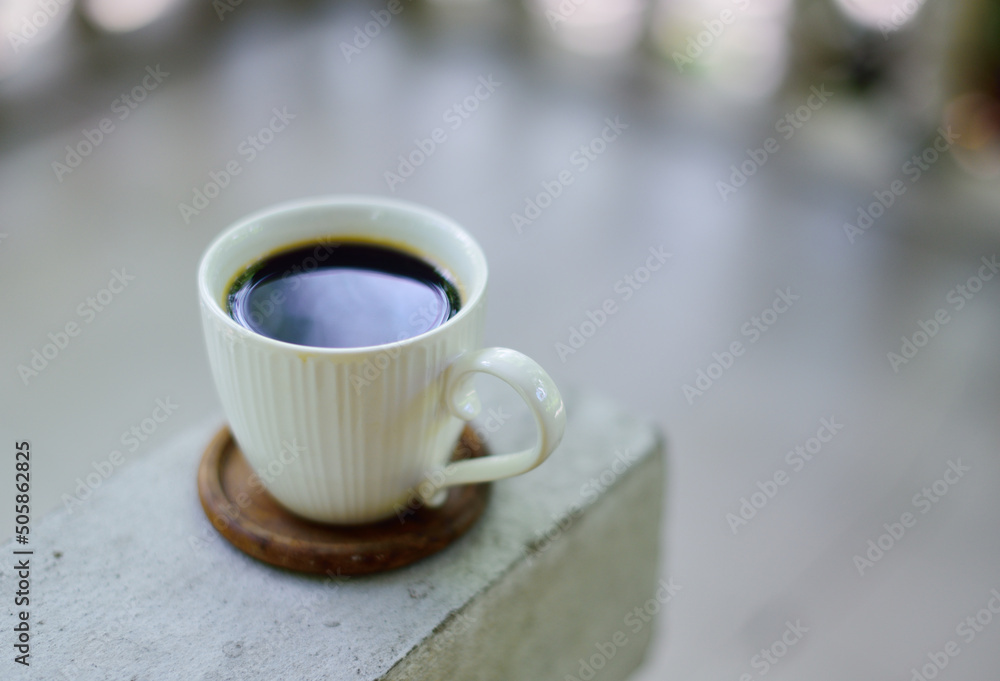 Hot coffee cup on railing, Coffee at home