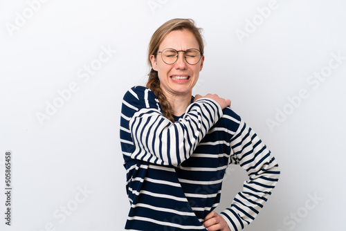 Young caucasian woman isolated on white background suffering from pain in shoulder for having made an effort © luismolinero