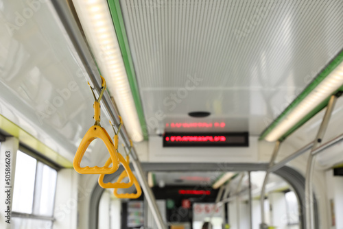 Grab pole with handgrip handles in public transport