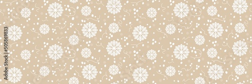 Seamless pattern with snowflakes on blue background for packaging and fabrics