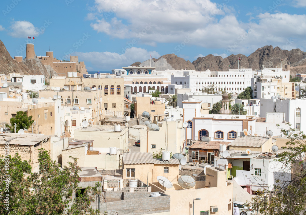Muscat, Oman - capital and most populated city in Oman, Muscat displays amazing spots where its white buildings are surrounded by impressive mountains and rock formations