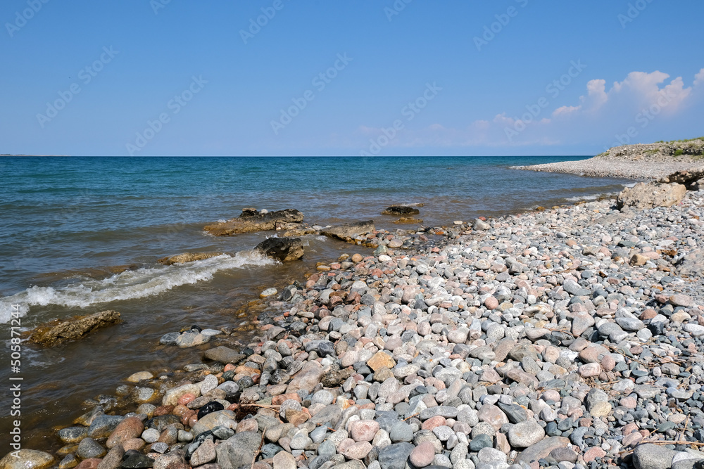 South coast of Issyk-Kul lake. beautiful Tamga Bay. Travel around Kyrgyzstan South coast of Issyk-Kul lake. beautiful Tamga Bay. Travel around Kyrgyzstan