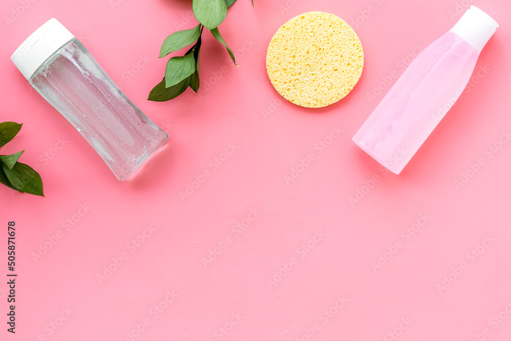 facial tonic, lotion and sponge for face care and plant on pink background top view mock up - obrazy, fototapety, plakaty 