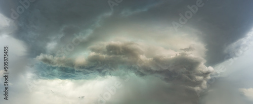 dramatic storm with stormy clouds and rain on sky