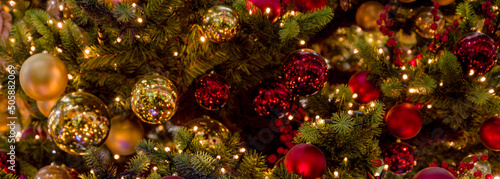 Defocused christmas tree with balls for text.Blurred image