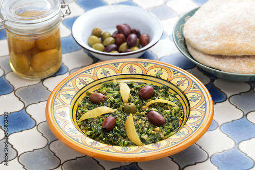  Moroccan mallow salad; the leaves are chopped, steamed and then sauteed with olive oil, spices, olives, and preserved lemons. photo