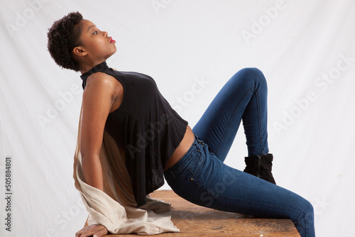 Fotografie Thoughtful black woman sitting