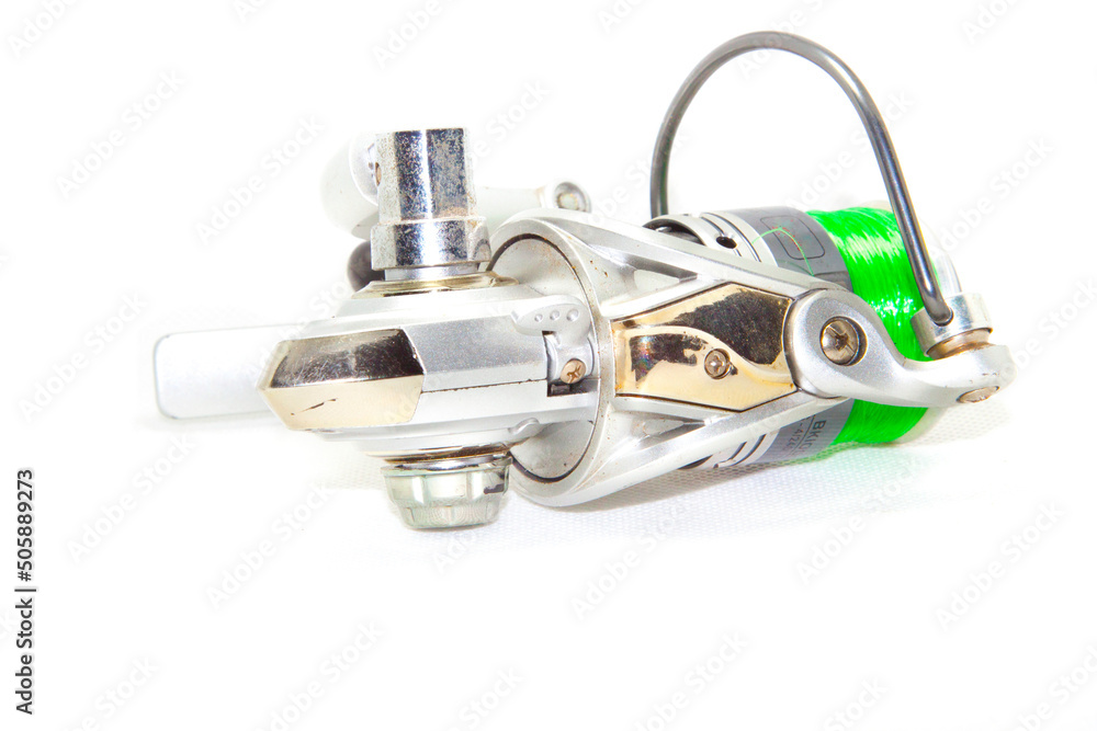 Fishing reels is a leisure sport or hobby of the unemployed, fishing is a popular thing for people to fish to eat and is a sport on a white background. Fishing reels is a leisure sport or hobby of the unemployed, fishing is a popular thing for people to fish to eat and is a sport on a white background.