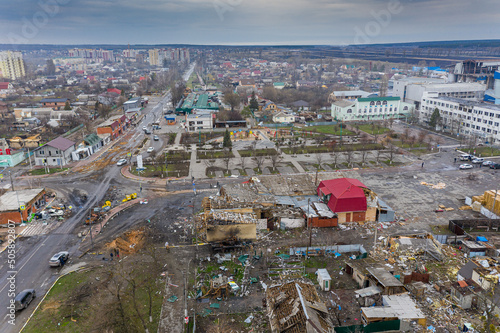 Gostomel, Kyev region Ukraine - 09.04.2022: The aerial view of the destroyed and burnt buildings. The buildings were destroyed by russian rockets and mines. The Ukrainian cities after occupation. #505892807