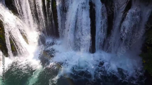 Aerial shot of Martin Brod waterfall in Bosnia, Una river in National park photo