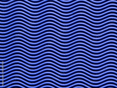 The Background Is Made Of Corrugated Wavy Cardboard in blue. The Texture Of Horizontal Waves Of Blue Paper. Relief waves on Paper background
