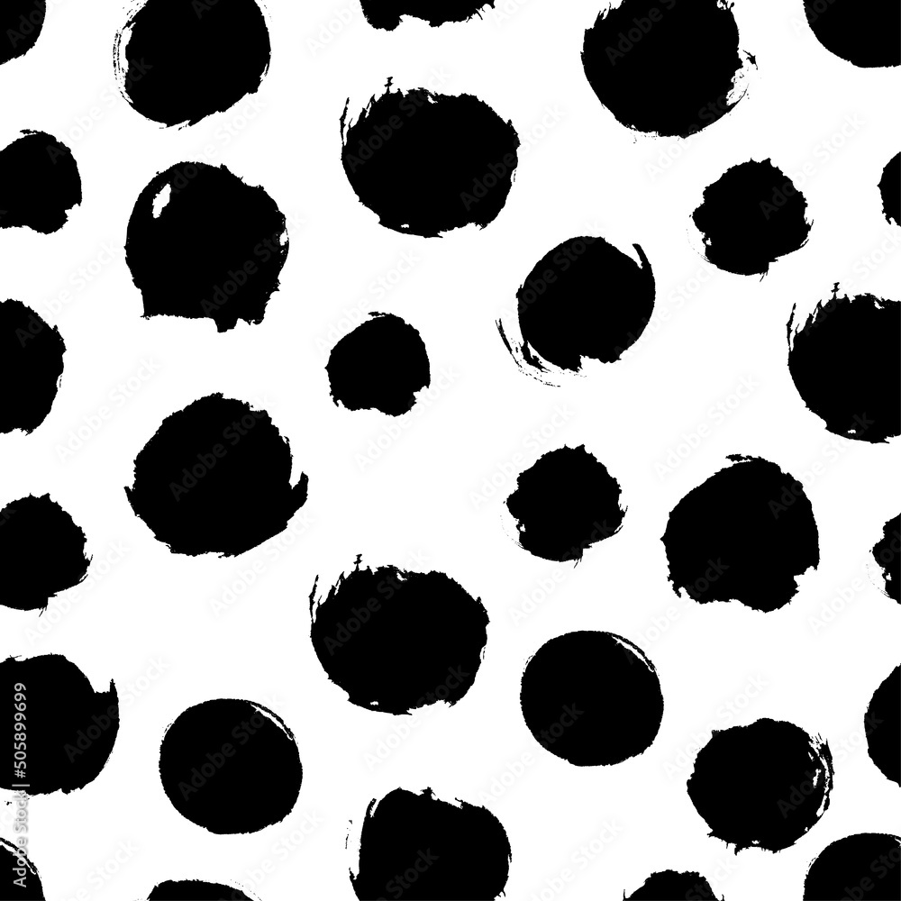 Black and white seamless dot pattern on white background. Hand ink painted circles. Design element for fabric, textile, wrapping paper. Black and white seamless dot pattern on white background. Hand ink painted circles. Design element for fabric, textile, wrapping paper.